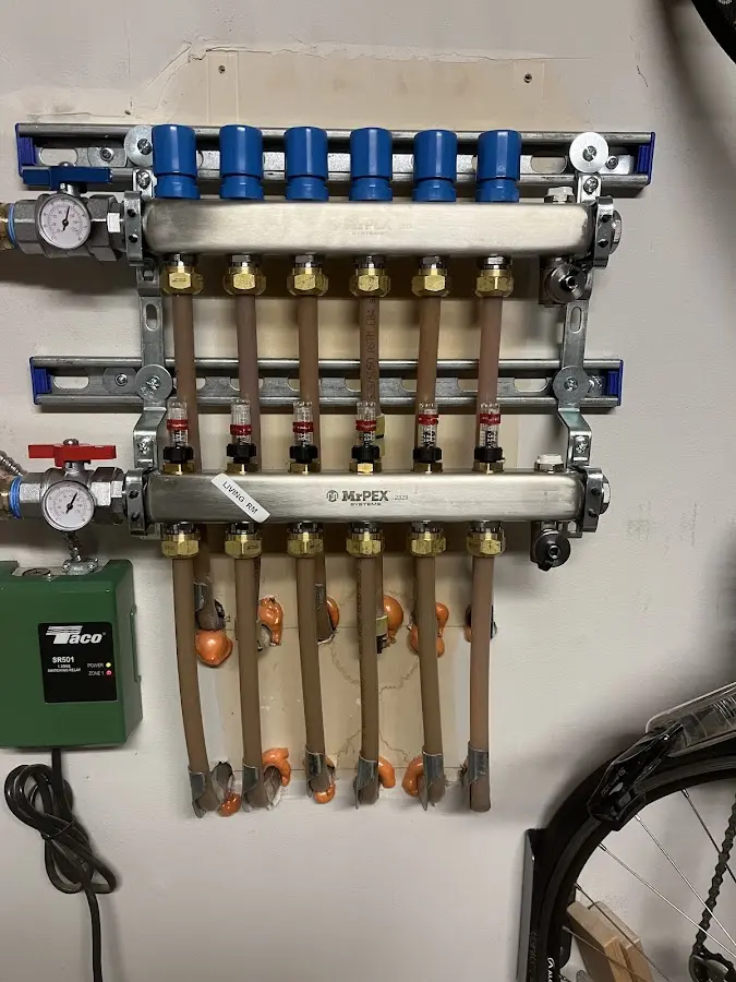 Plumber performing Gas Line Installation at a residential property in Hartford City